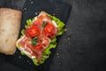 Ciabatta sandwich with salad leaves jamon serrano mozzarella Royalty Free Stock Photo