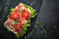 Ciabatta sandwich with salad leaves jamon serrano mozzarella Royalty Free Stock Photo