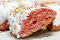 The ciaramicola is a typical Umbrian Easter cake; it is a donut-shaped cake, red in color with white icing and colored topping spr Royalty Free Stock Photo