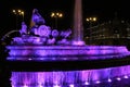 Cibeles fountain illuminated in purple for Women's Day Royalty Free Stock Photo