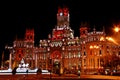 Cibeles Palace and Cibeles fountain at night.