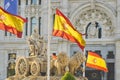 Cibeles statue with flags half-mast