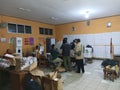 Cibinong 14 February 2024, several people are counting election ballot papers in a school room