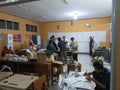 Cibinong 14 February 2024, several people are counting election ballot papers in a school room Royalty Free Stock Photo
