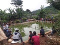 Cicalengka, Indonesia. people carry out fishing activities in the pond