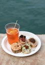 Cicchetti and Aperol Spritz traditional venetian food and drink Royalty Free Stock Photo