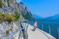 Bicycle road and foot path over Garda lake with beautiful landscape scenery at Limone Sul Garda - travel destination in Brescia, I Royalty Free Stock Photo