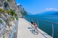 Bicycle road and foot path over Garda lake with beautiful landscape scenery at Limone Sul Garda - travel destination in Brescia, I Royalty Free Stock Photo