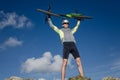 ciclyst raising the mountain bike above his head happy with success Royalty Free Stock Photo