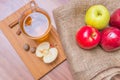 Cider - alcohol hot apple drink and apples on wooden table. Top view Royalty Free Stock Photo