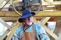 Cider Press in Middle Ages festival in medieval village Riquewihr Alsace France.