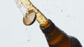 Cider splashing misted flask closeup. Cold lager beverage foaming fountaining Royalty Free Stock Photo