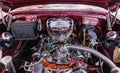 CIENFUEGOS, CUBA - MARCH 11, 2018 Red Chevrolet 350 fitfyfive - 1955 Chevy Nomad Restomod. View under the front bonnet on the engi Royalty Free Stock Photo