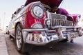 CIENFUEGOS, CUBA - MARCH 11, 2018 Red Chevrolet 350 fitfyfive - 1955 Chevy Nomad Restomod. View under the front bonnet on the engi Royalty Free Stock Photo