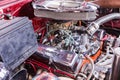 CIENFUEGOS, CUBA - MARCH 11, 2018 Red Chevrolet 350 fitfyfive - 1955 Chevy Nomad Restomod. View under the front bonnet on the engi Royalty Free Stock Photo