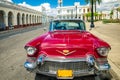 Cienfuegos , CUBA - 22 MARCH 2012 : Red Old retro Car on authentic streets Cuba Cienfuegos Royalty Free Stock Photo