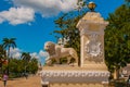 CIENFUEGOS, CUBA: Sculpture white Stone lion. View of Parque Jose Marti square in Cienfuegos.