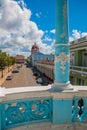 CIENFUEGOS, CUBA: View of the building Municipality through the blue columns of the Palace.