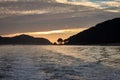 Cies Islands in Galicia Spain seen from the boat returning to Vigo at sunset. Royalty Free Stock Photo