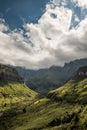 Ciffs and mountain sides under dramatic skies on the Thukela hike to the bottom of the Amphitheatre`s Tugela Falls