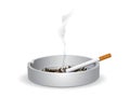 Cigarette on the ashtray Royalty Free Stock Photo