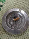 cigarette ashtray full of dust Royalty Free Stock Photo