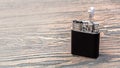 Cigarette lighter on a wooden