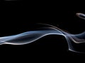 Cigarette smoke on black background, macro shot