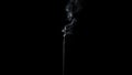 Cigarette smoke isolated on dark background Royalty Free Stock Photo