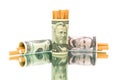 Cigarettes and money. white background - horizontal photo. Royalty Free Stock Photo