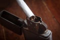 Cigarettes with old metal lighter. Royalty Free Stock Photo