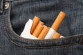 Cigarettes in pocket of jeans Royalty Free Stock Photo