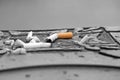 Cigarettes in street ashtray Royalty Free Stock Photo