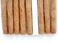 Cigarillo in a white background Royalty Free Stock Photo
