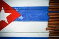 Cigars on painted Cuban national flag Royalty Free Stock Photo