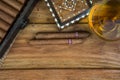 Cigars and Rum or alcohol on table Royalty Free Stock Photo