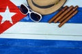 Cigars straw Panama hat and sun glasses Royalty Free Stock Photo