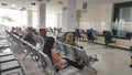 Sitting and waiting in waiting room - stock photo