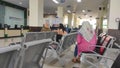 Sitting and waiting in waiting room - stock photo