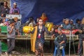 A transgender sinden singing Javanese songs to accompany the kuda lumping or ebeg dance which is a typical dance from the island Royalty Free Stock Photo