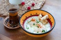 Cilbir, poached egg in yogurt with spiced butter and herbs, turkish cuisine