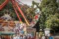 Cildren in a swinging ship in the amusement park Bakken Royalty Free Stock Photo