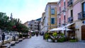 Cilento coast, Scario. Campania, Italy. View of the Corso with colorful buildings and bars