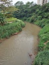 The Ciliwung River passes beside the Atohir Mosque Royalty Free Stock Photo