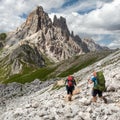 Cima Ambrizzola and Croda da Lago with three hikers Royalty Free Stock Photo