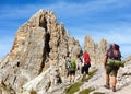 Cima Ambrizzola and Croda da Lago with three hikers Royalty Free Stock Photo