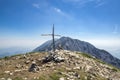 Cima delle Pozzette, wooden cross on the top of a mountain, hiking trail Alta Via del Monte Baldo Royalty Free Stock Photo