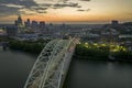 Cincinnati, Ohio with driving cars on Daniel Carter Beard Bridge highway near illuminated high skyscraper buildings in Royalty Free Stock Photo