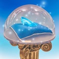Cinderella`s crystal shoe on a blue pillow close-up.