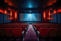 Cinema auditorium with red seats and projector screen in night time Royalty Free Stock Photo